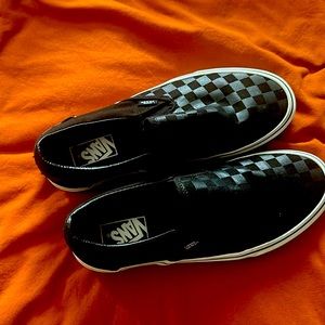 Vans slip ons, Sz 8.5 in men’s and 10 in women’s,